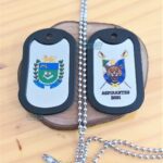Dog tags coloridas com brasão e onça, "Aspirantes 2021".